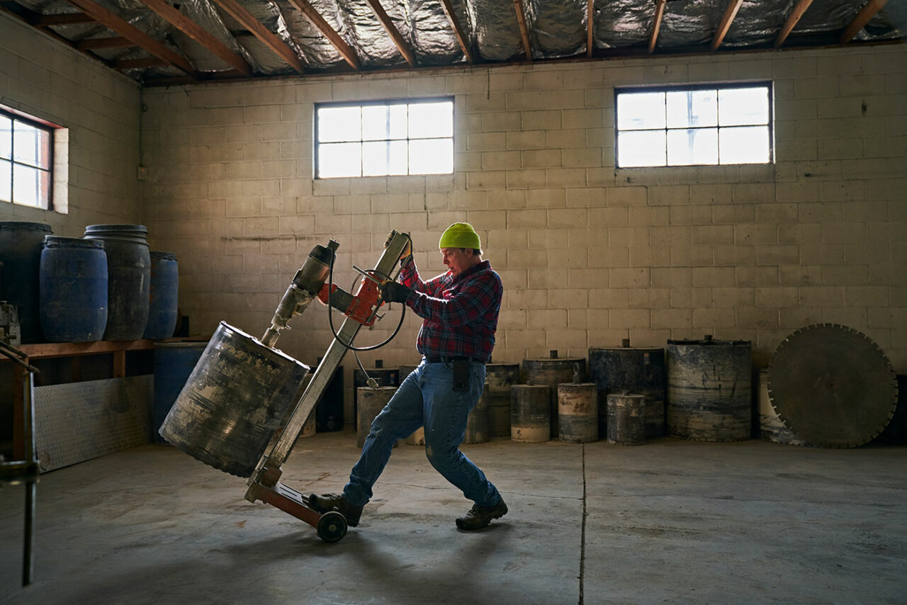 worker moving things around warehouse