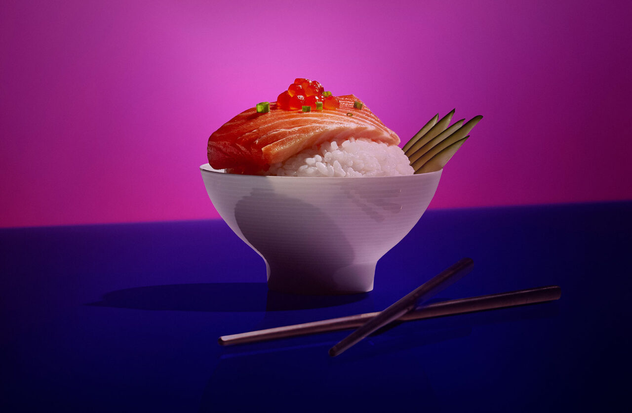 sushi sashimi over rice bold colorful food photography