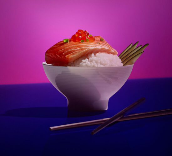sushi sashimi over rice bold colorful food photography
